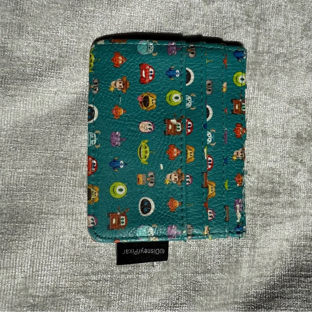 Disney Pixar Teal Character Print Wallet OS